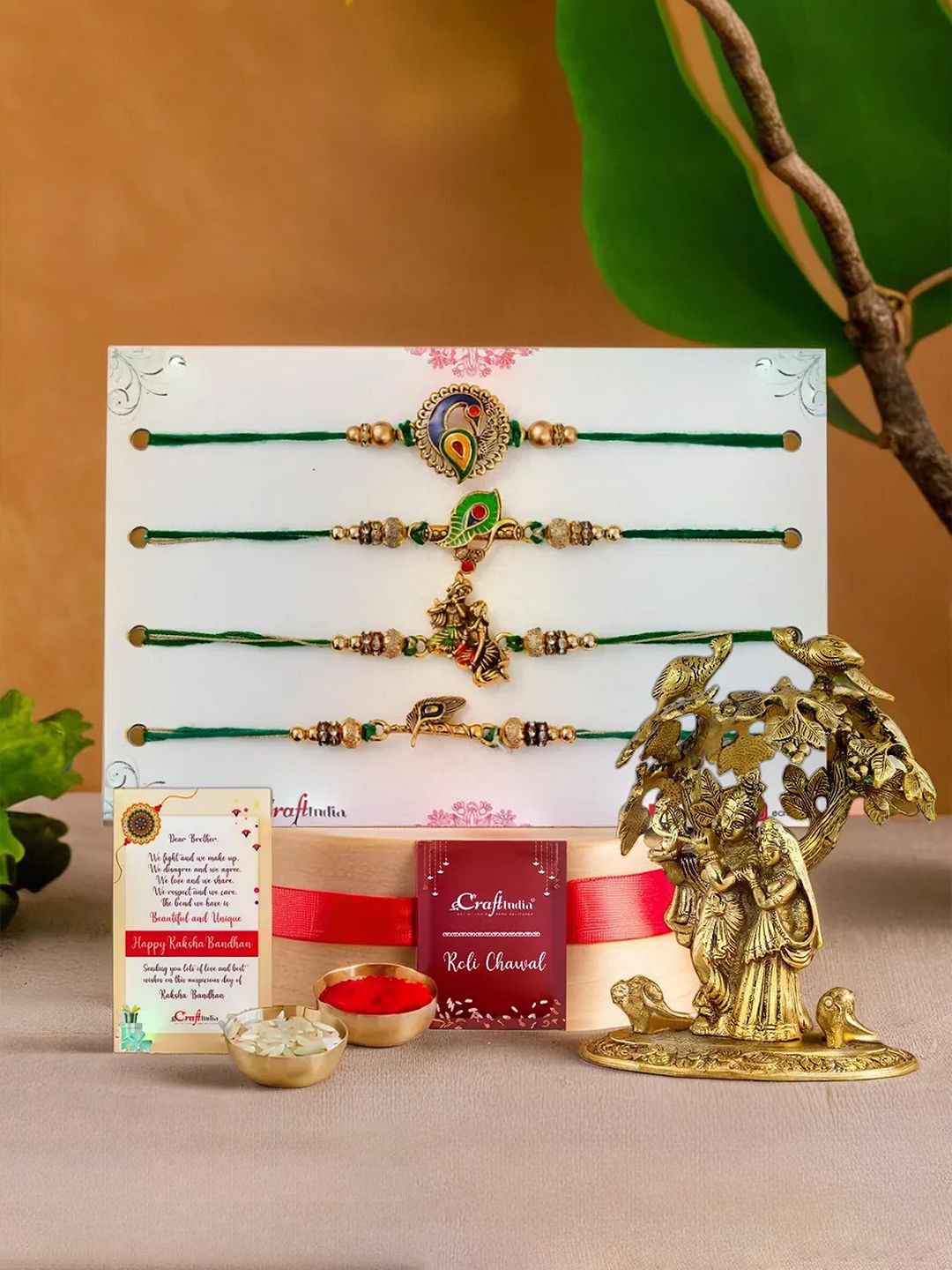 

eCraftIndia Set Of 5 Rakhis With Radha Krishna Statue & Roli Chawal, Gold