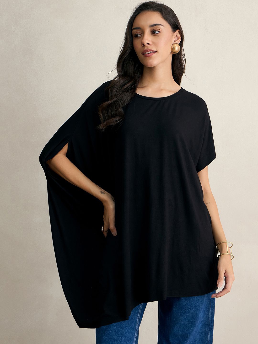 

FEMMELLA Women Solid Round Neck Top, Black