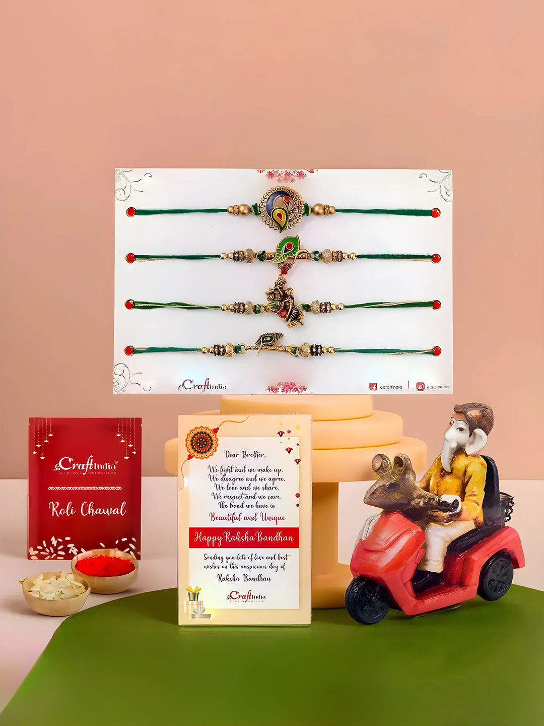 

eCraftIndia Set Of 4 Rakhi With Riding Statue & Greeting Card & Roli Chawal Gift Set, Gold