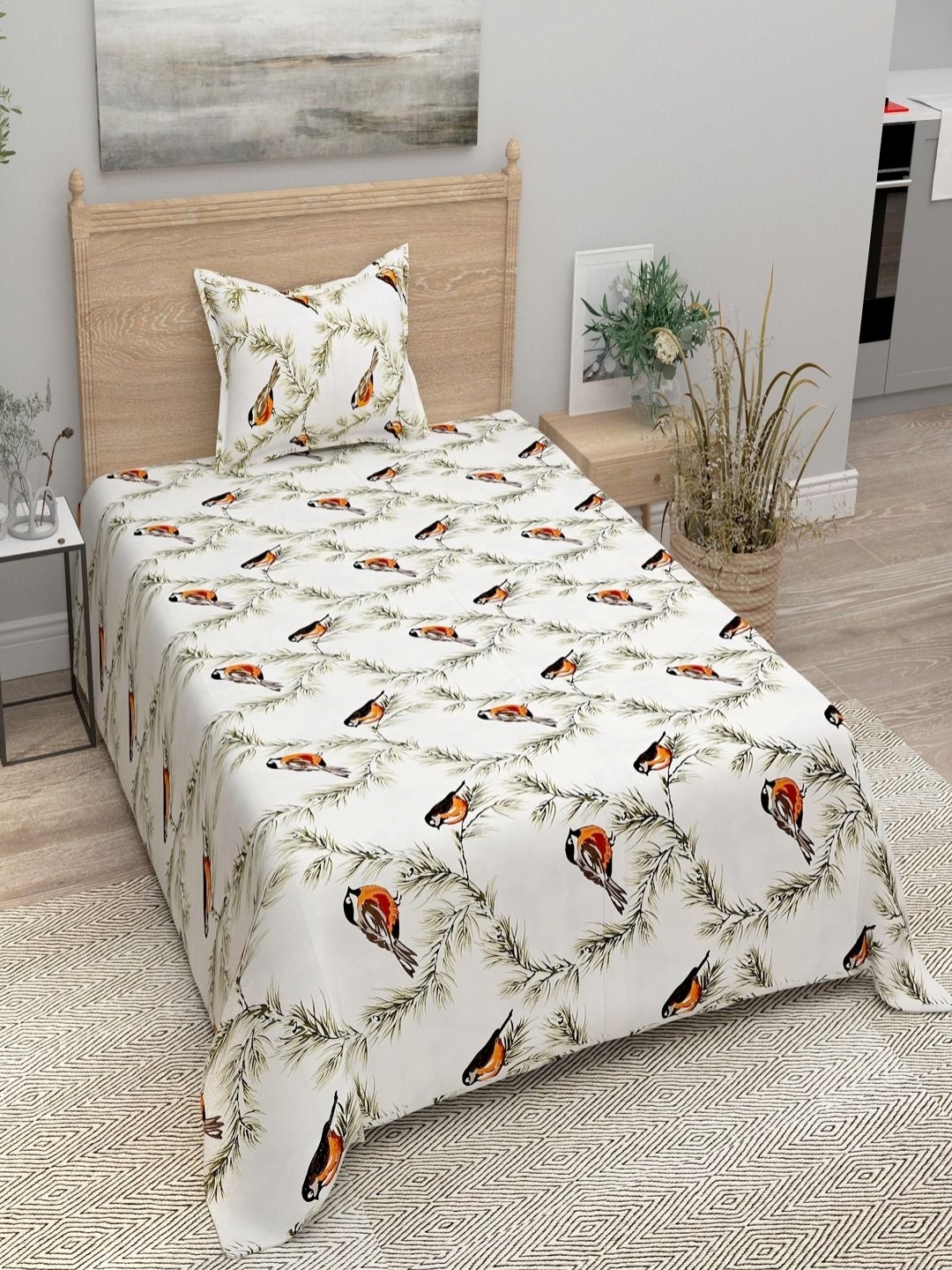 

Aura Orange & White Floral 144 TC Single Bedsheet with 1 Pillow Covers