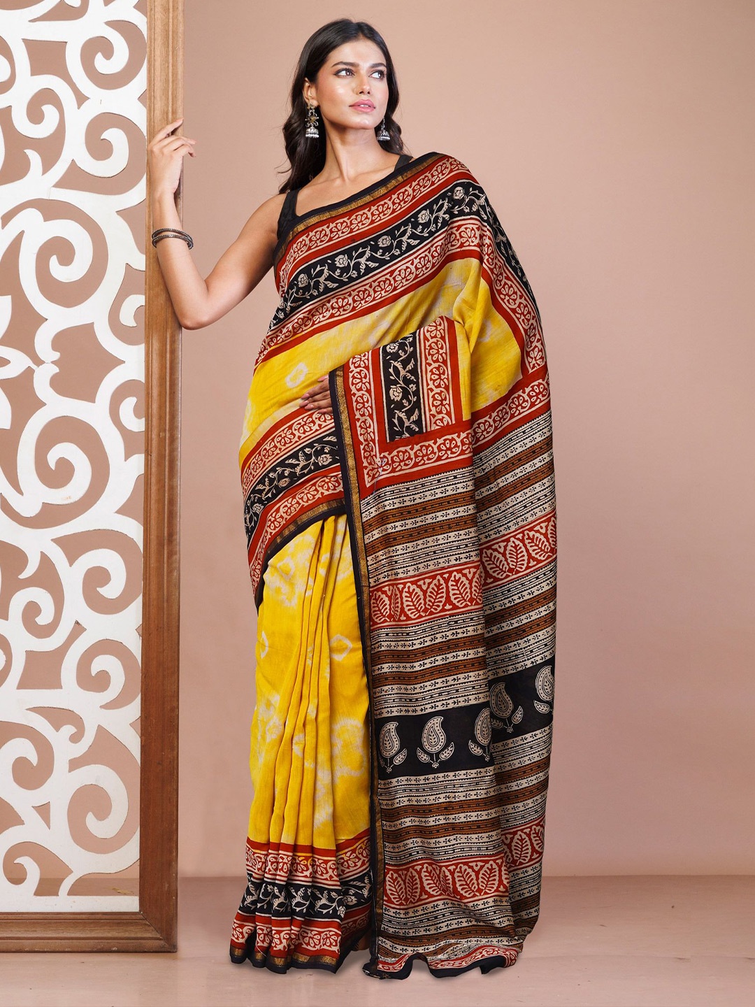 

Unnati Silks Tie and Dye Zari Silk Cotton Handloom Bagru Saree, Yellow
