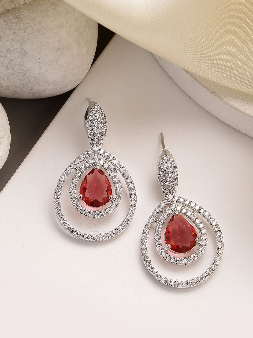 

ZENEME Rhodium-Plated American Diamond Studded Teardrop Shaped Drop Earrings, Red