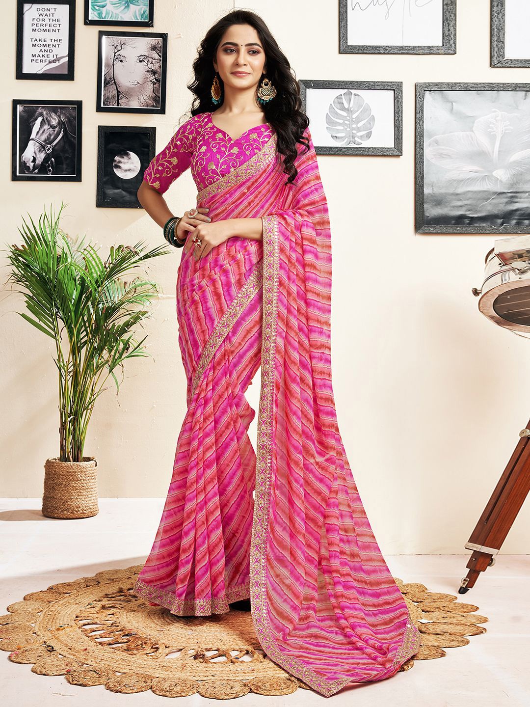

Mitera Leheriya printed pure georgette saree with blouse piece, Magenta