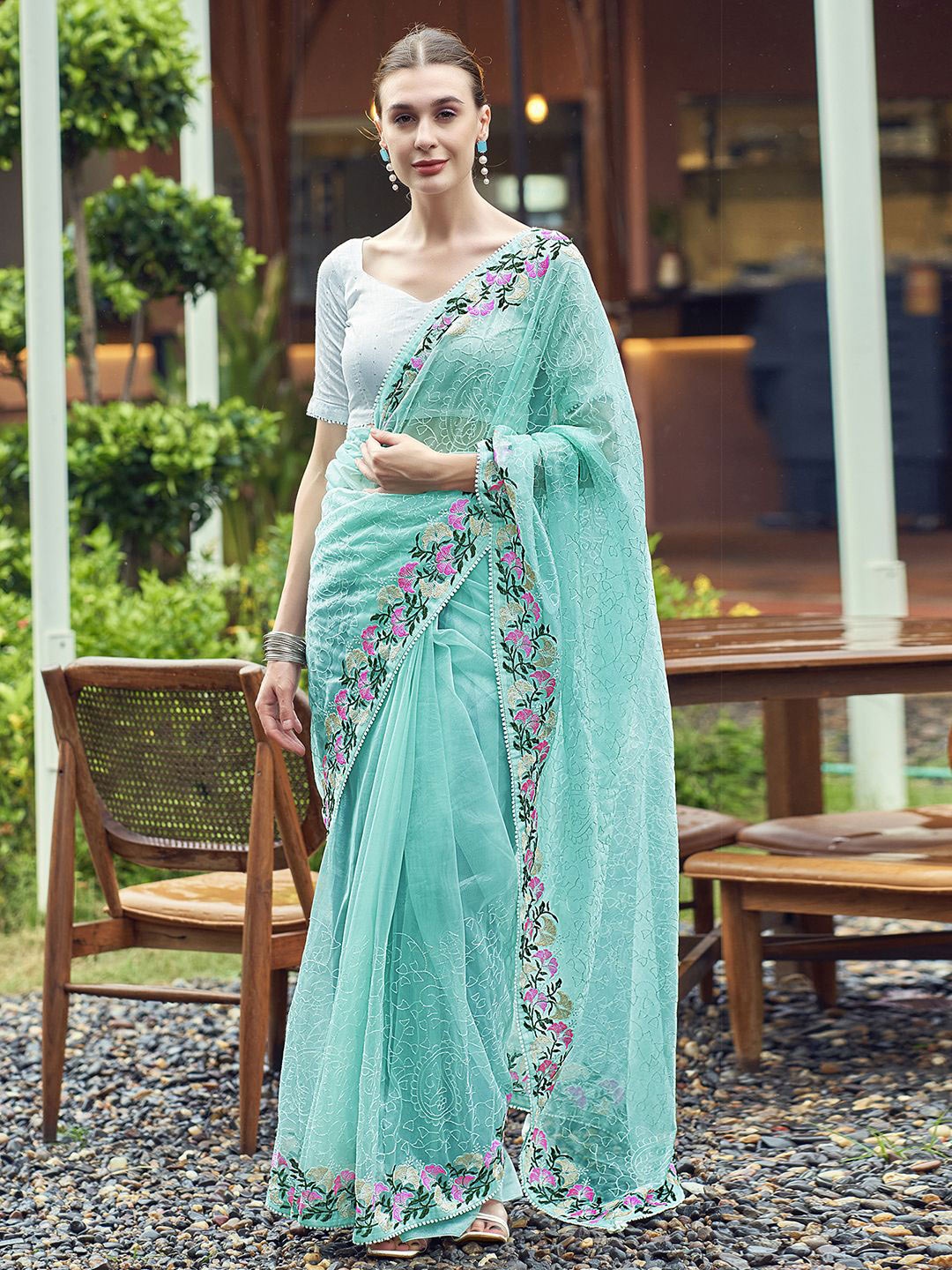 

Satrani Women Ethnic Motifs Sequinned Saree With Embroidered Border, Turquoise blue