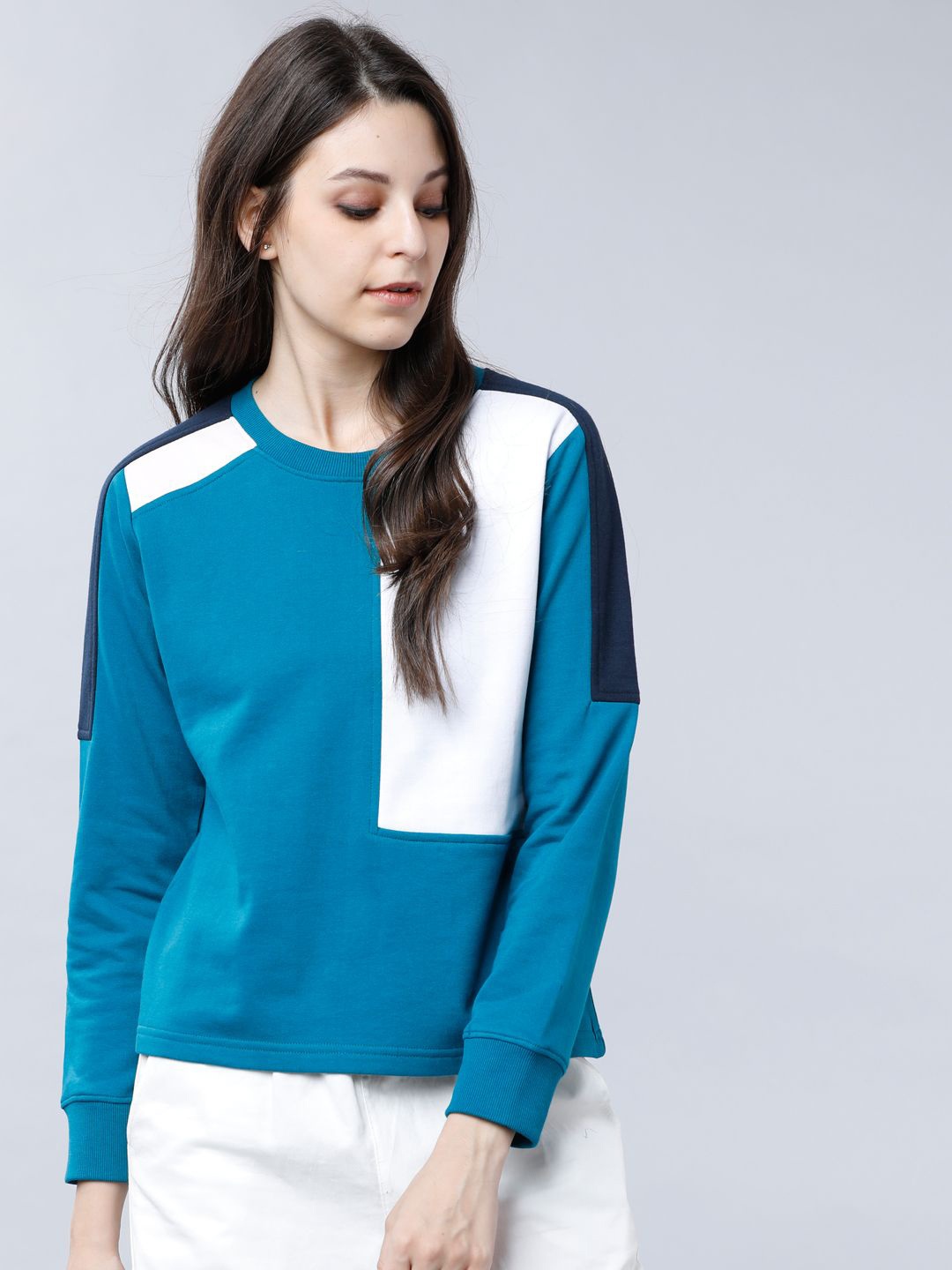 

Tokyo Talkies Women Colourblocked Sweatshirt, Teal