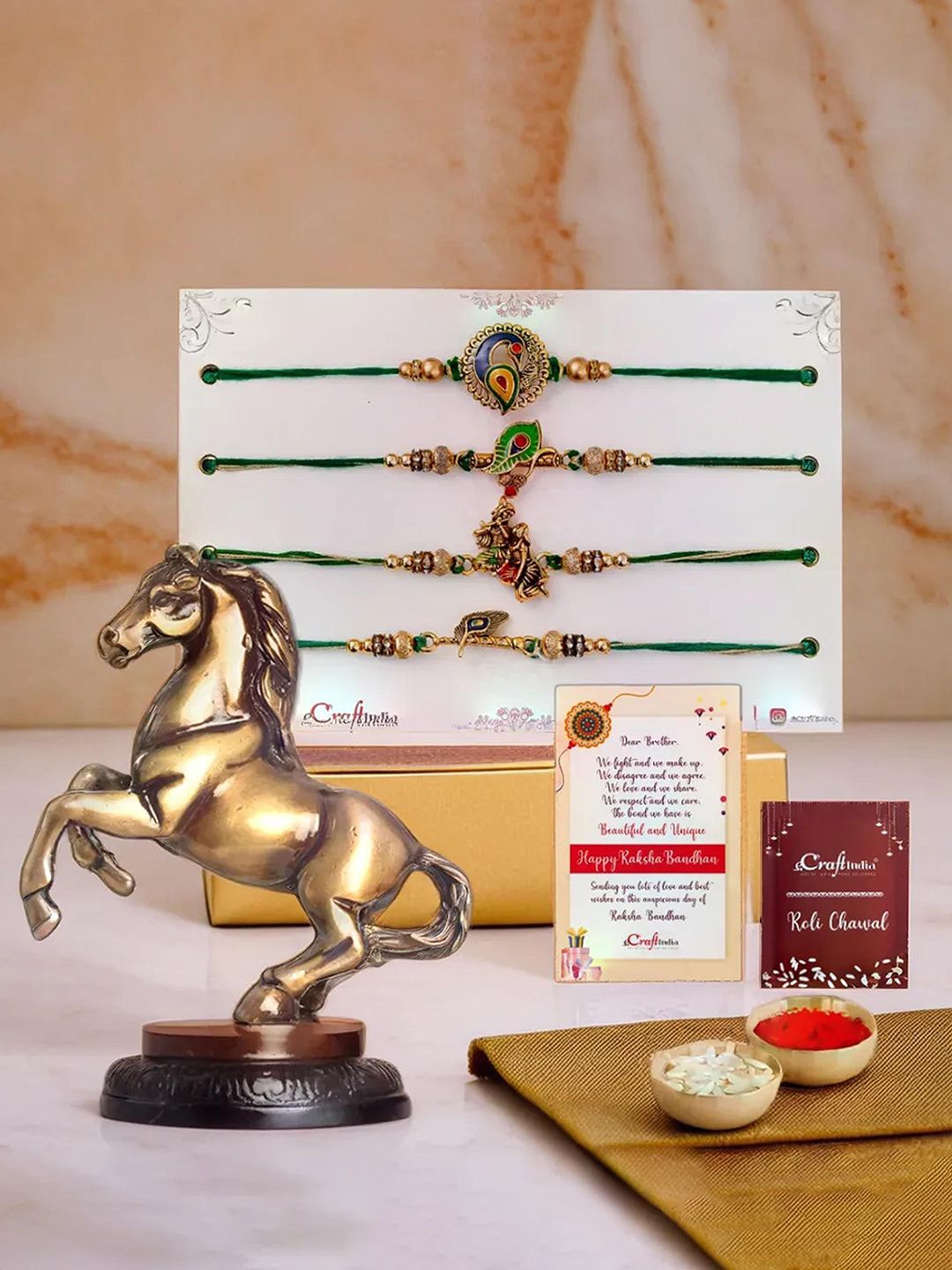 

eCraftIndia Set Of 4 Designer Rakhis With Brass Jumping Horse Statue, Gold