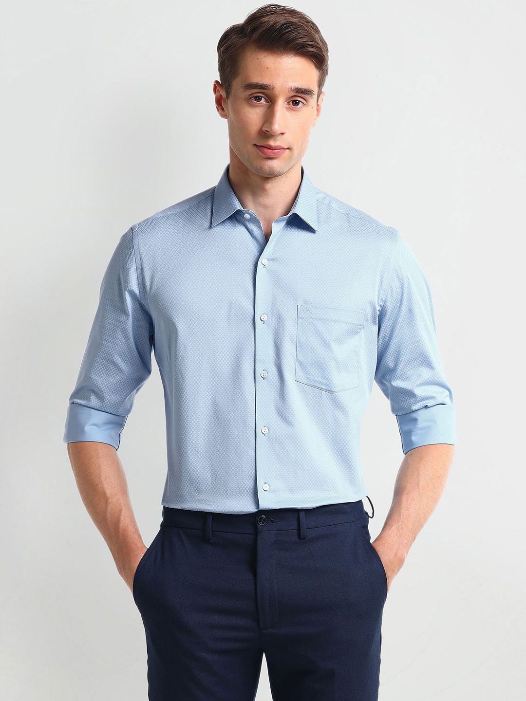 

Arrow Men Spread Collar Solid Cotton Formal Shirt, Blue