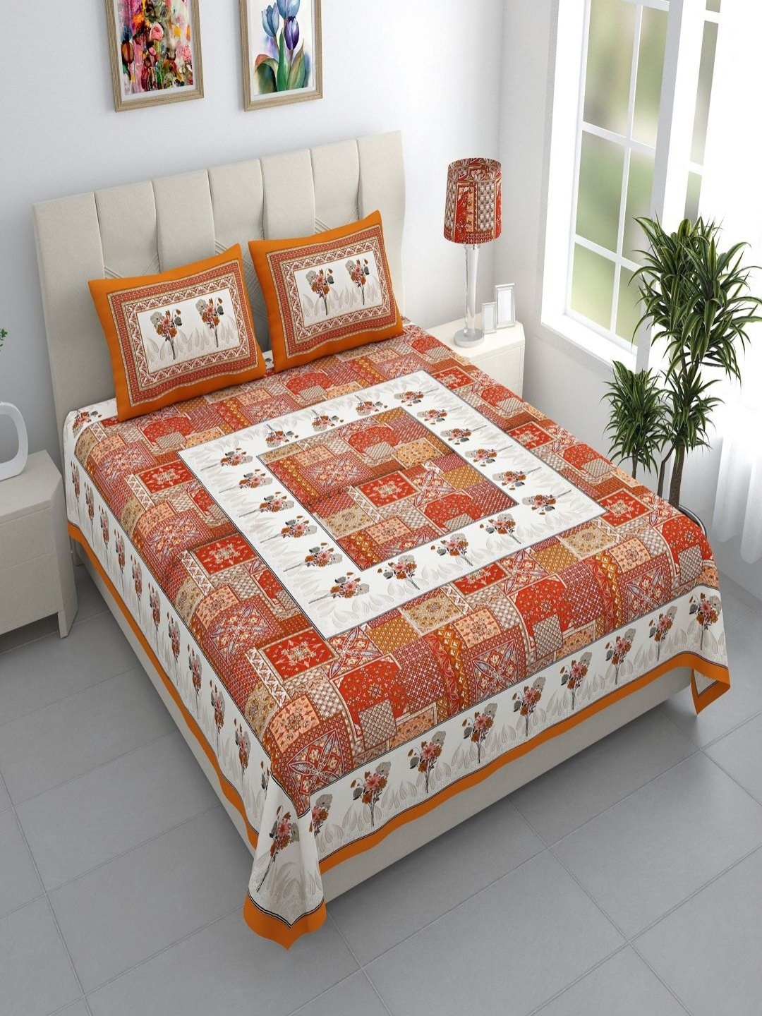 

Aura Orange & White Floral 144 TC King Bedsheet with 2 Pillow Covers