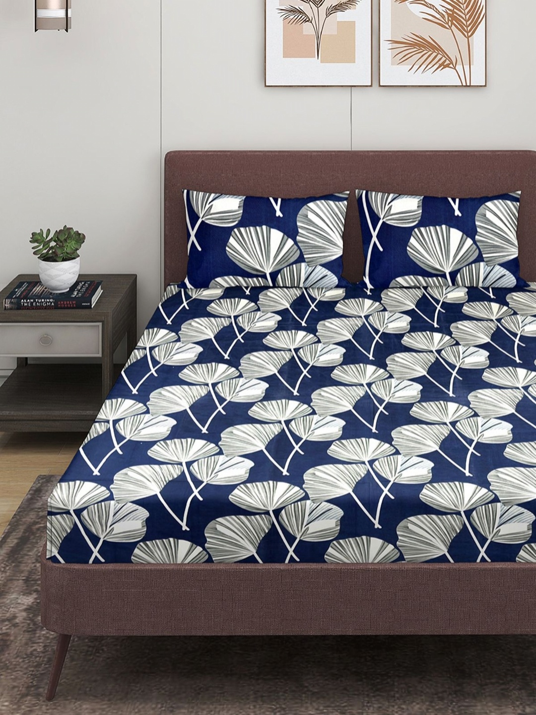 

Myntra Elegant Homes Blue & White Floral 160 TC Queen Bedsheet with 2 Pillow Covers