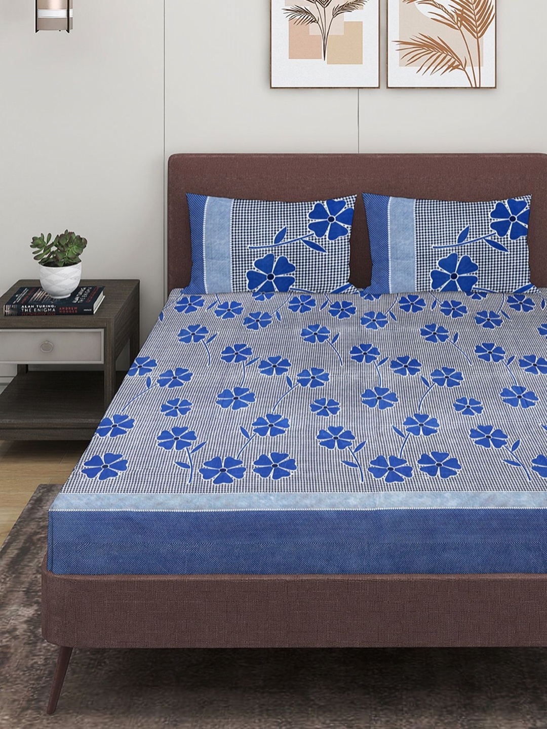 

Myntra Elegant Homes Blue & White Floral 160 TC Queen Bedsheet with 2 Pillow Covers