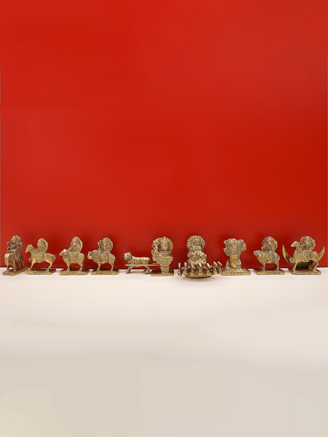 

Exotic India 9-Pcs Yellow Brass Navagraha Set Showpieces