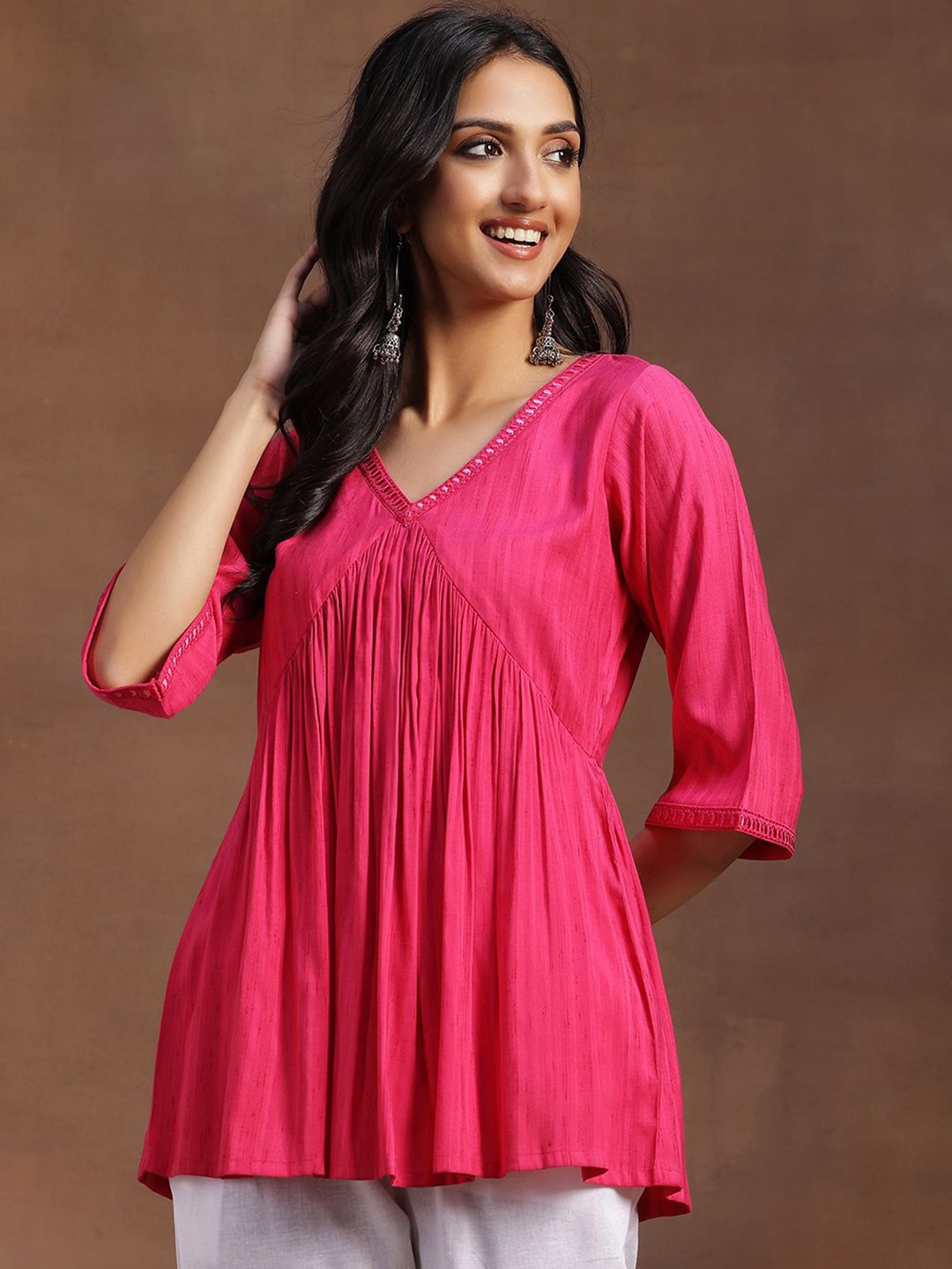 

Libas V-Neck Flared Sleeves Thread Work Thread Work Pleated Kurti, Pink