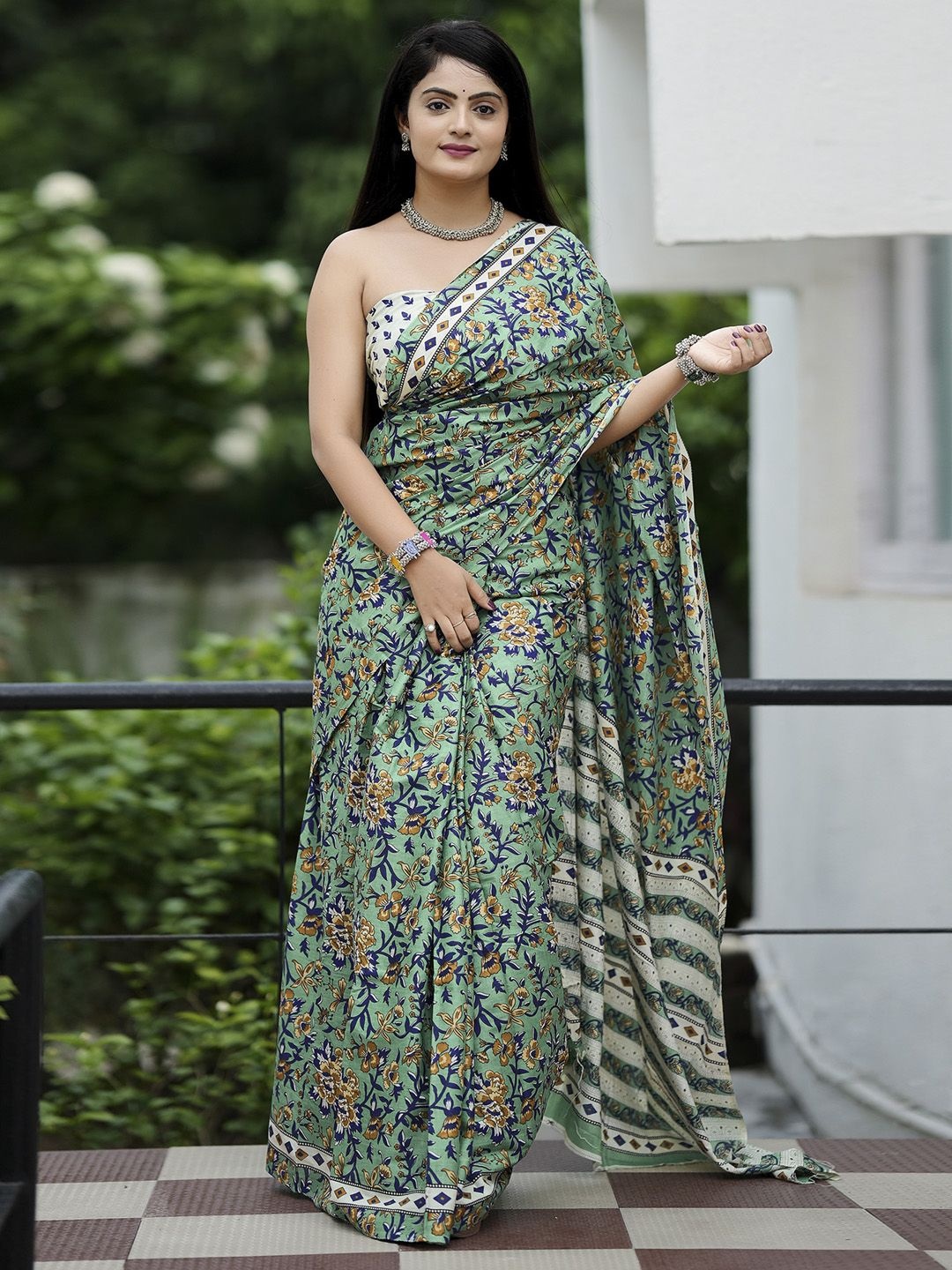 

KALINI floral printed bagru saree with blouse piece, Sea green