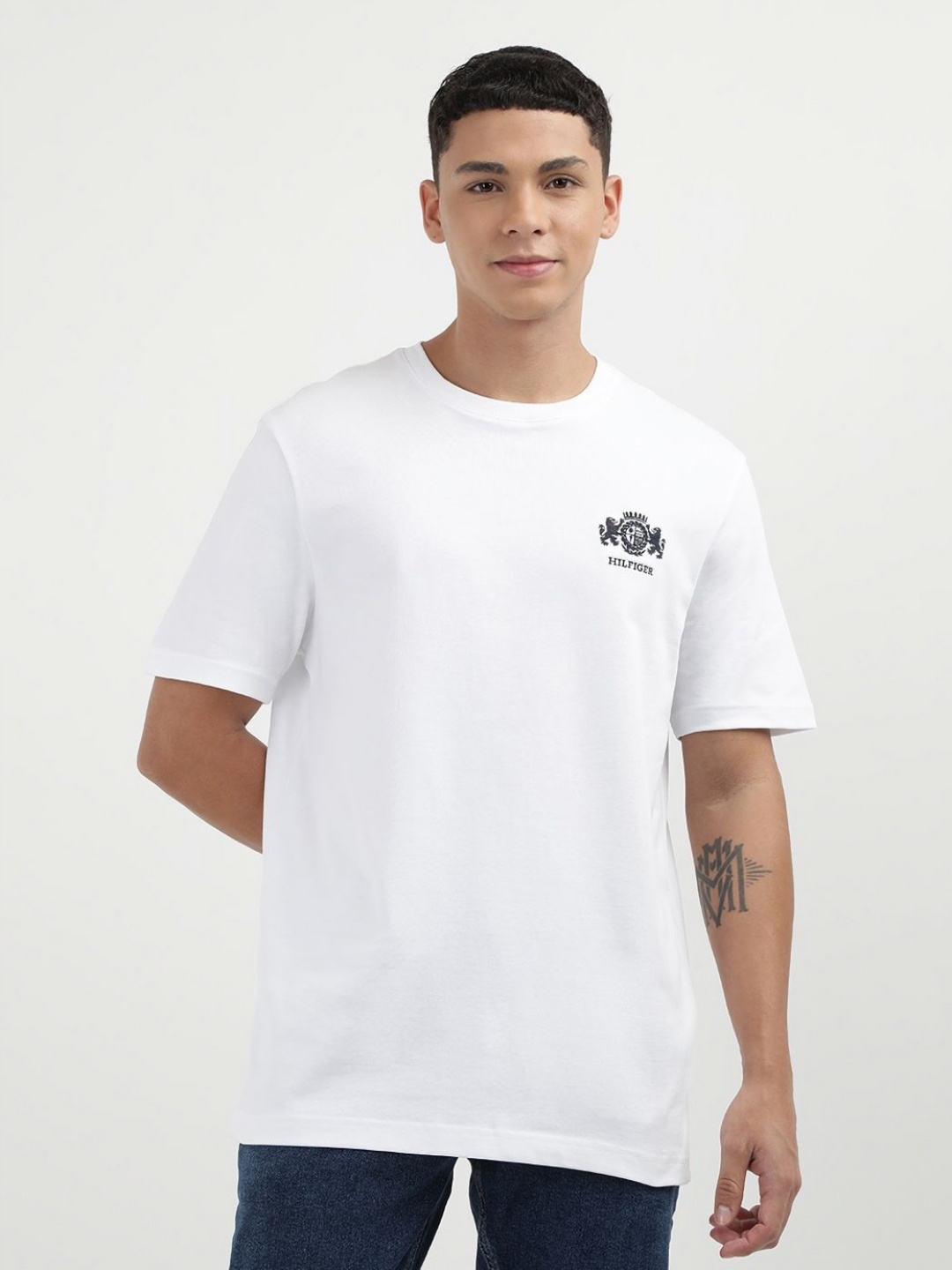 

Tommy Hilfiger Men Solid Round Neck Cotton Oversized T-shirt, White