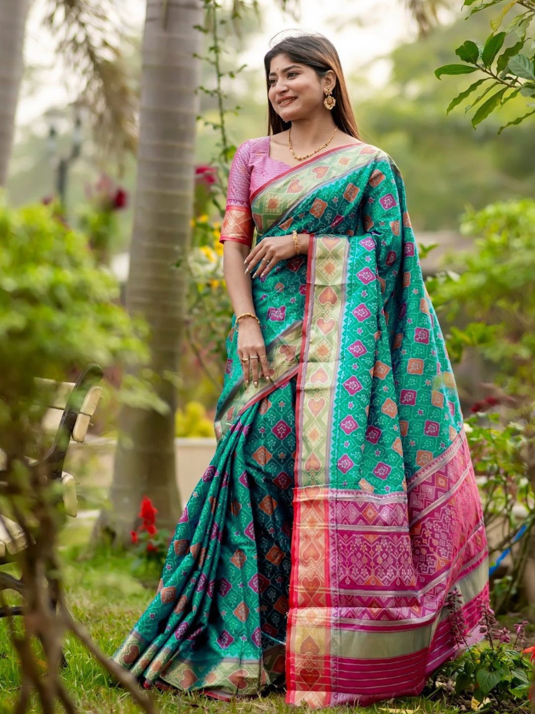 

Mitera abstract printed Patola Saree with blouse piece, Green