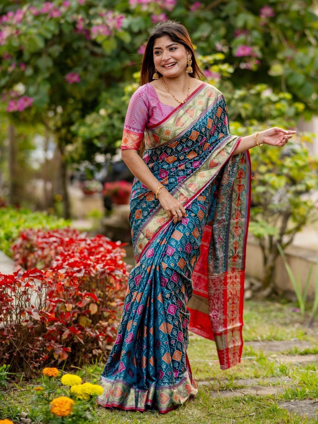 

Mitera Ethnic Motifs Woven Design Zari Patola Saree, Blue