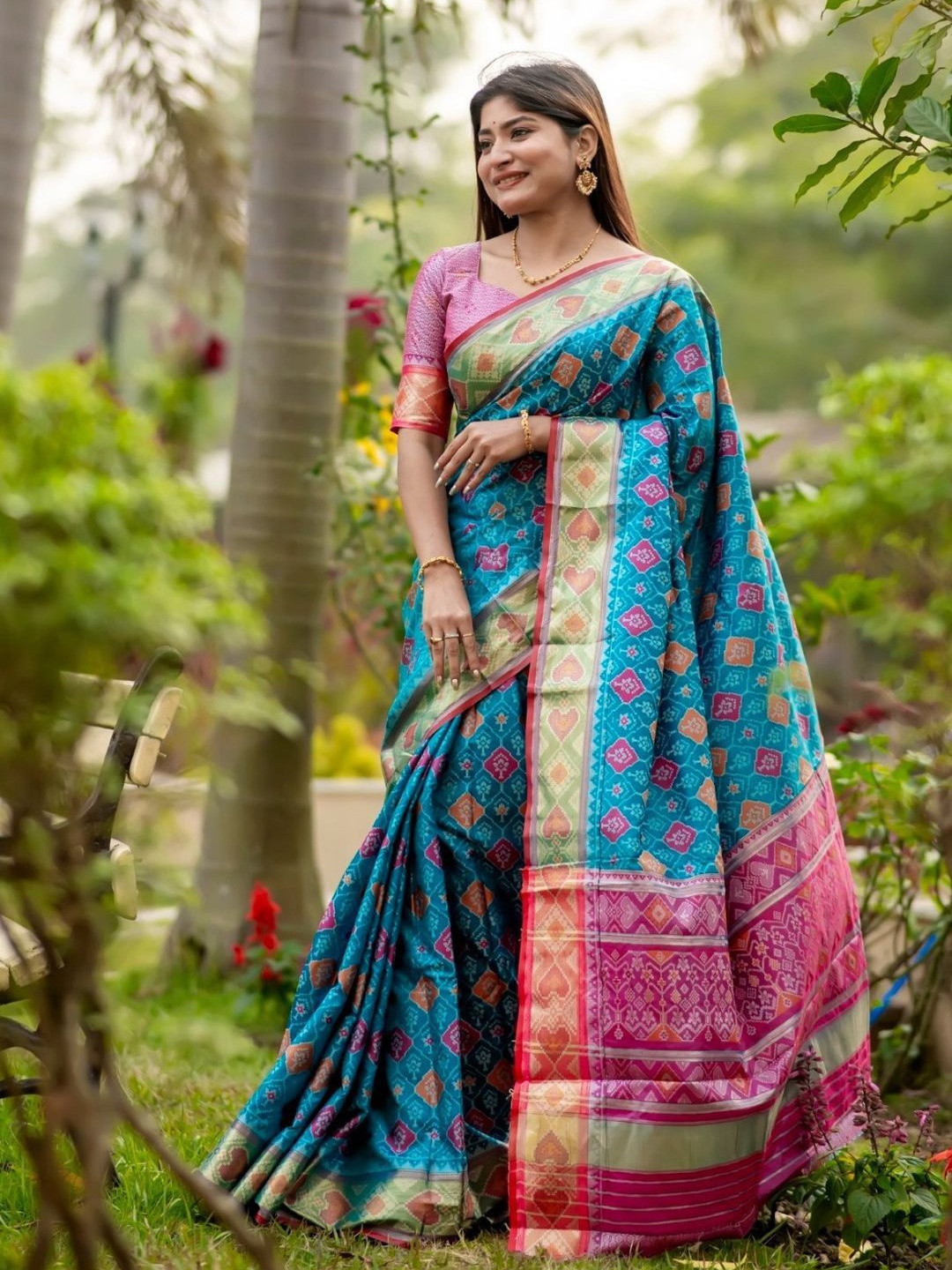 

Mitera Floral Zari Designer Patola Saree, Turquoise blue