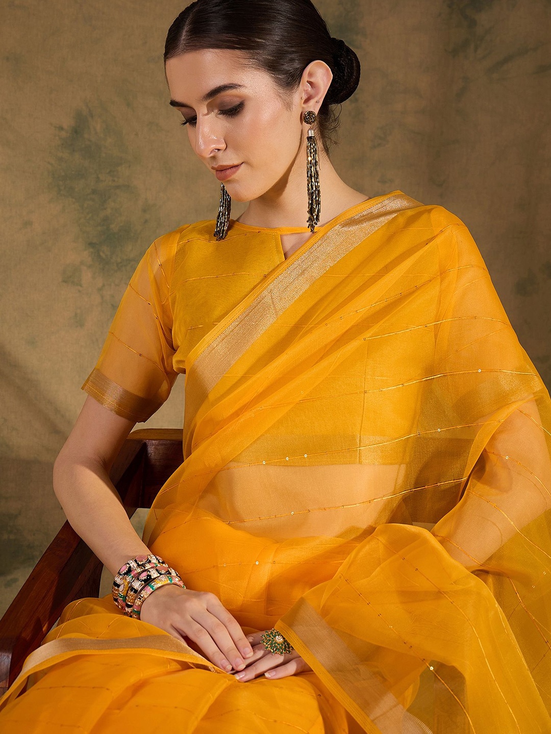 

NIRMAL CREATION Striped Sequinned Saree, Yellow