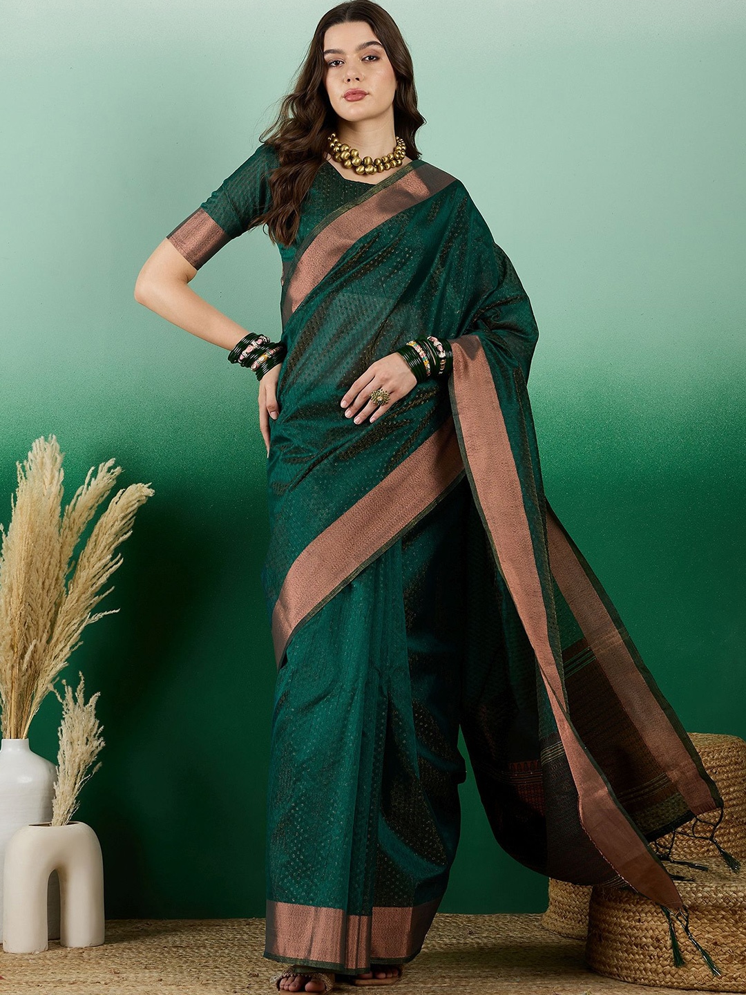 

NIRMAL CREATION Ethnic Motifs Zari Saree, Green