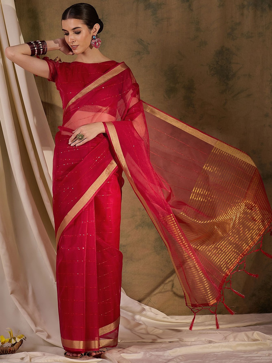 

NIRMAL CREATION Striped Sequinned Saree, Red