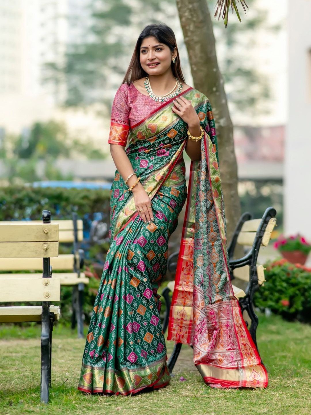 

Mitera Ethnic Motifs Woven Design Zari Patola Saree, Sea green