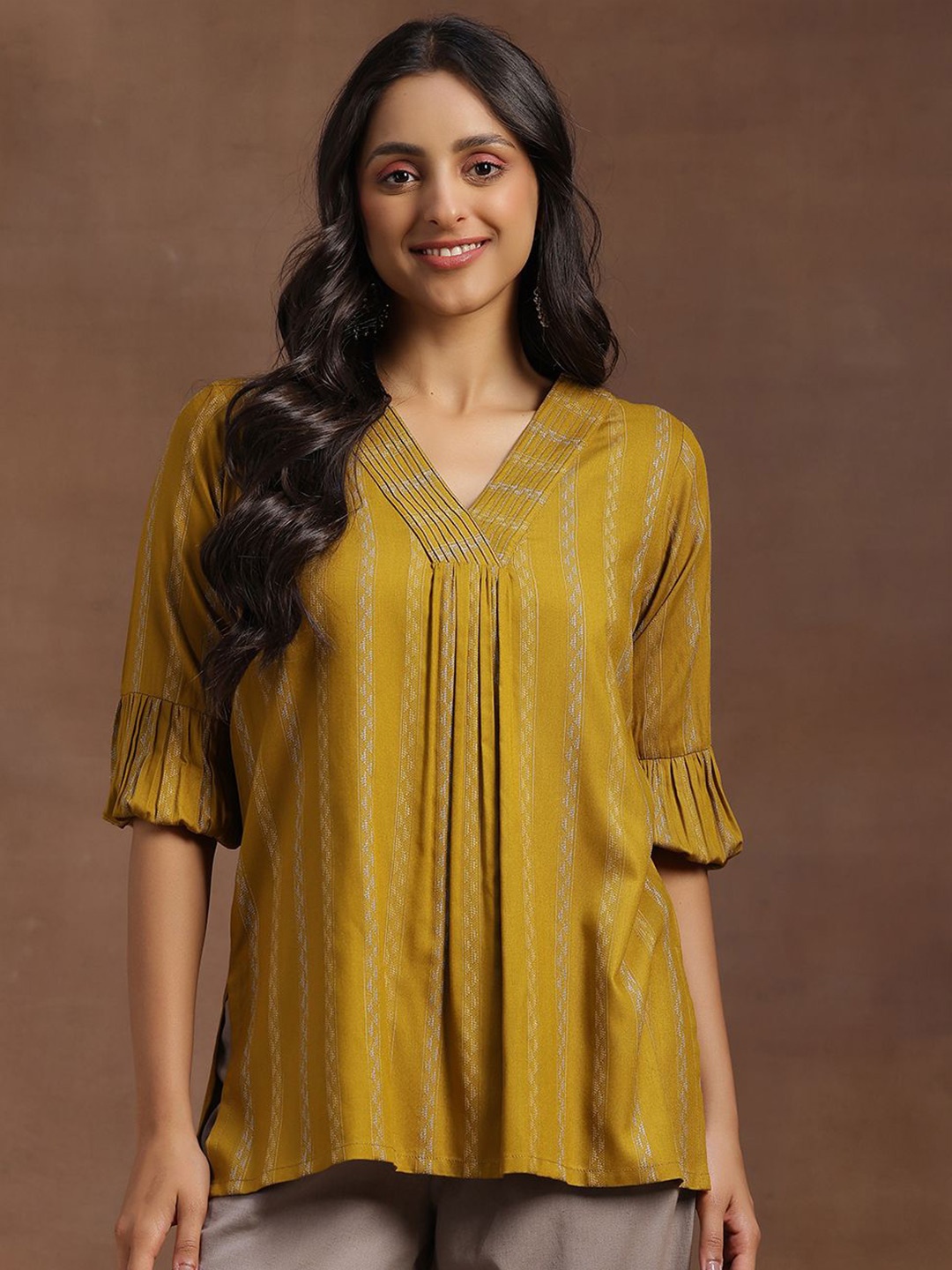 

Libas Ethnic Motifs Woven Design V-Neck Pleated Kurti, Mustard