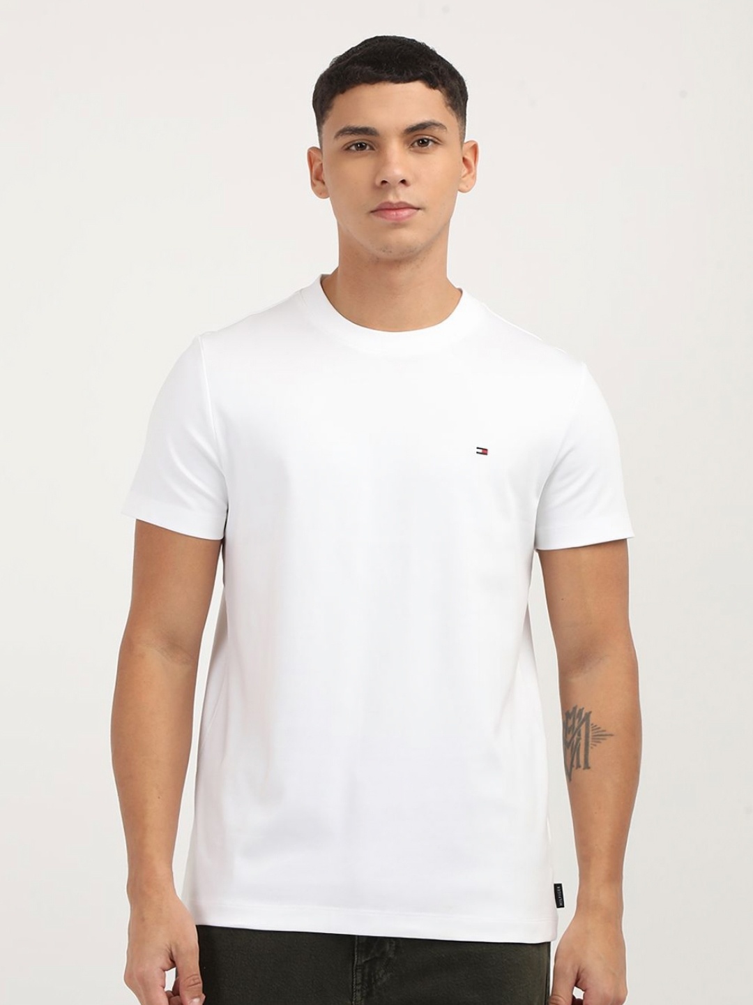 

Tommy Hilfiger Men Solid Round Neck Cotton T-shirt, White