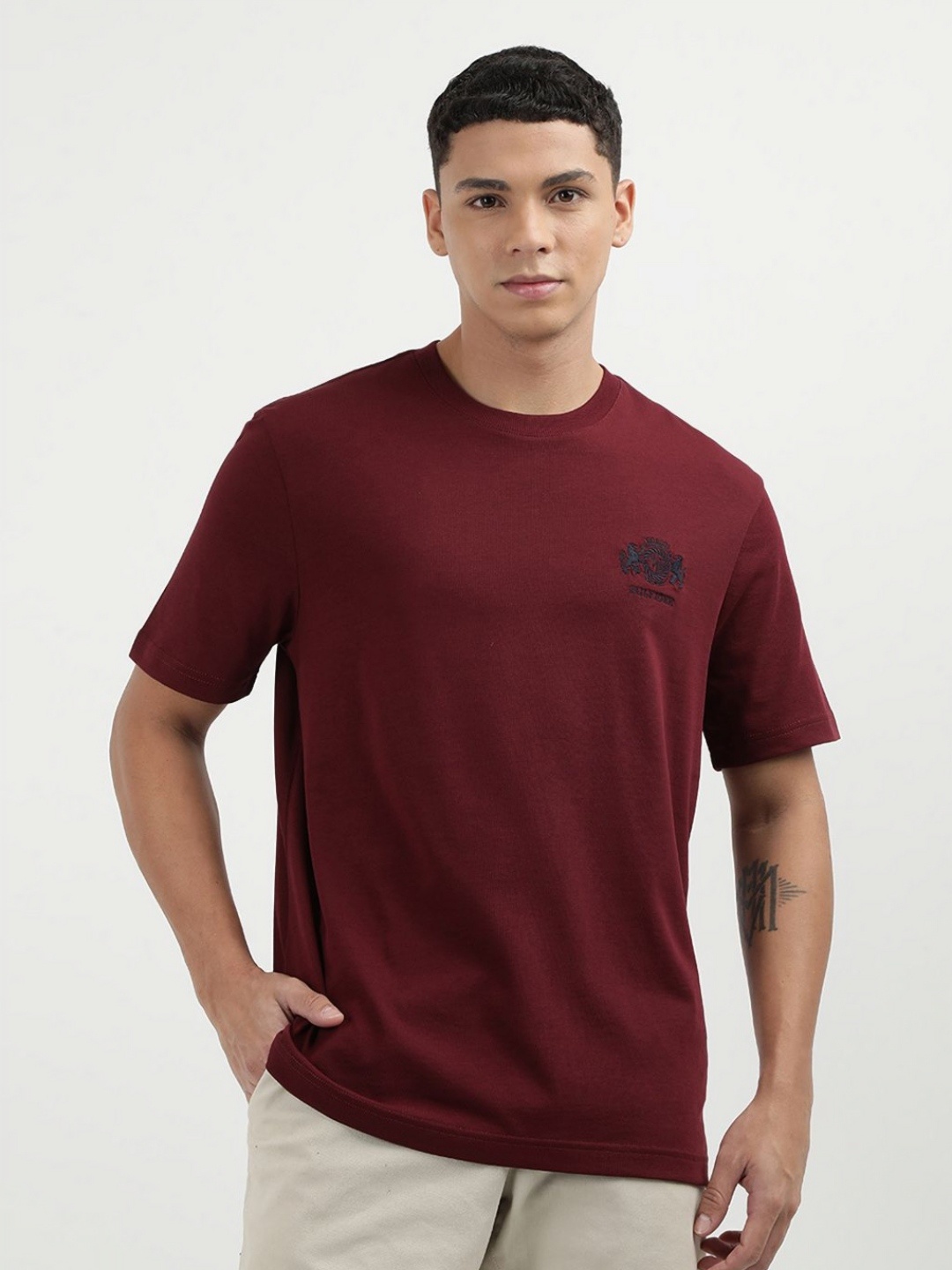 

Tommy Hilfiger Men Solid Round Neck Cotton T-shirt, Maroon