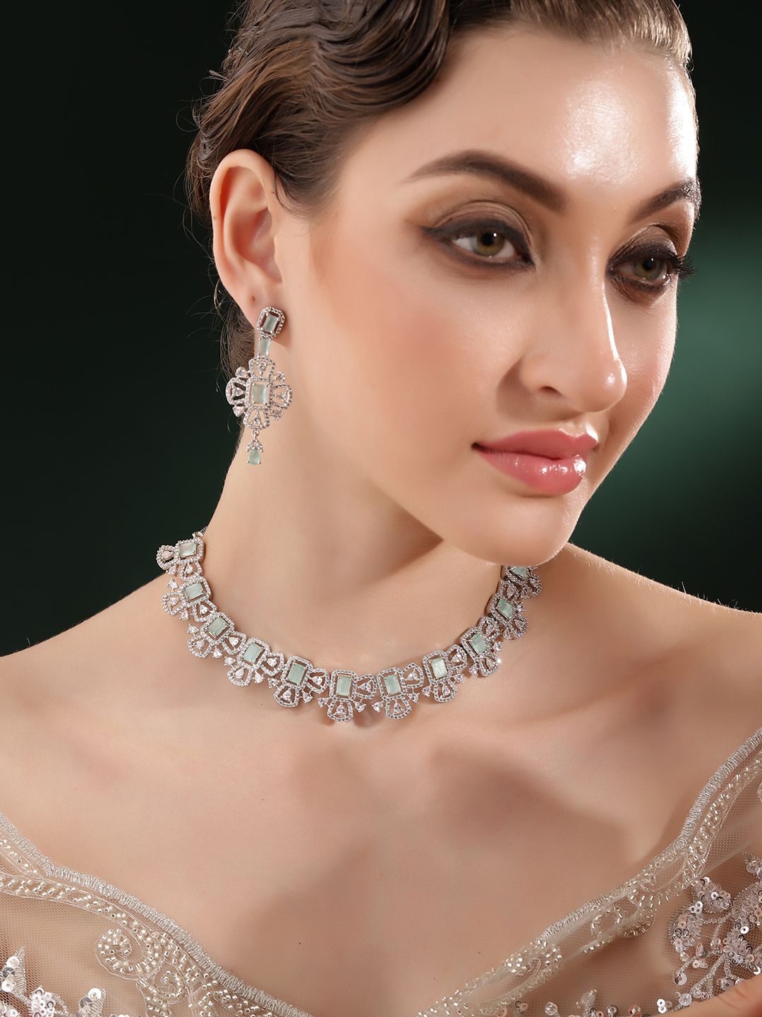 

Priyaasi Silver-Plated American Diamond Studded Jewellery Set