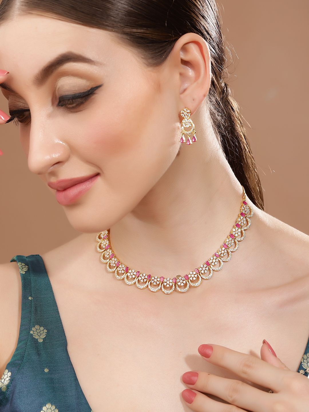 

Priyaasi Gold Plated American Diamond Studded Jewellery Set