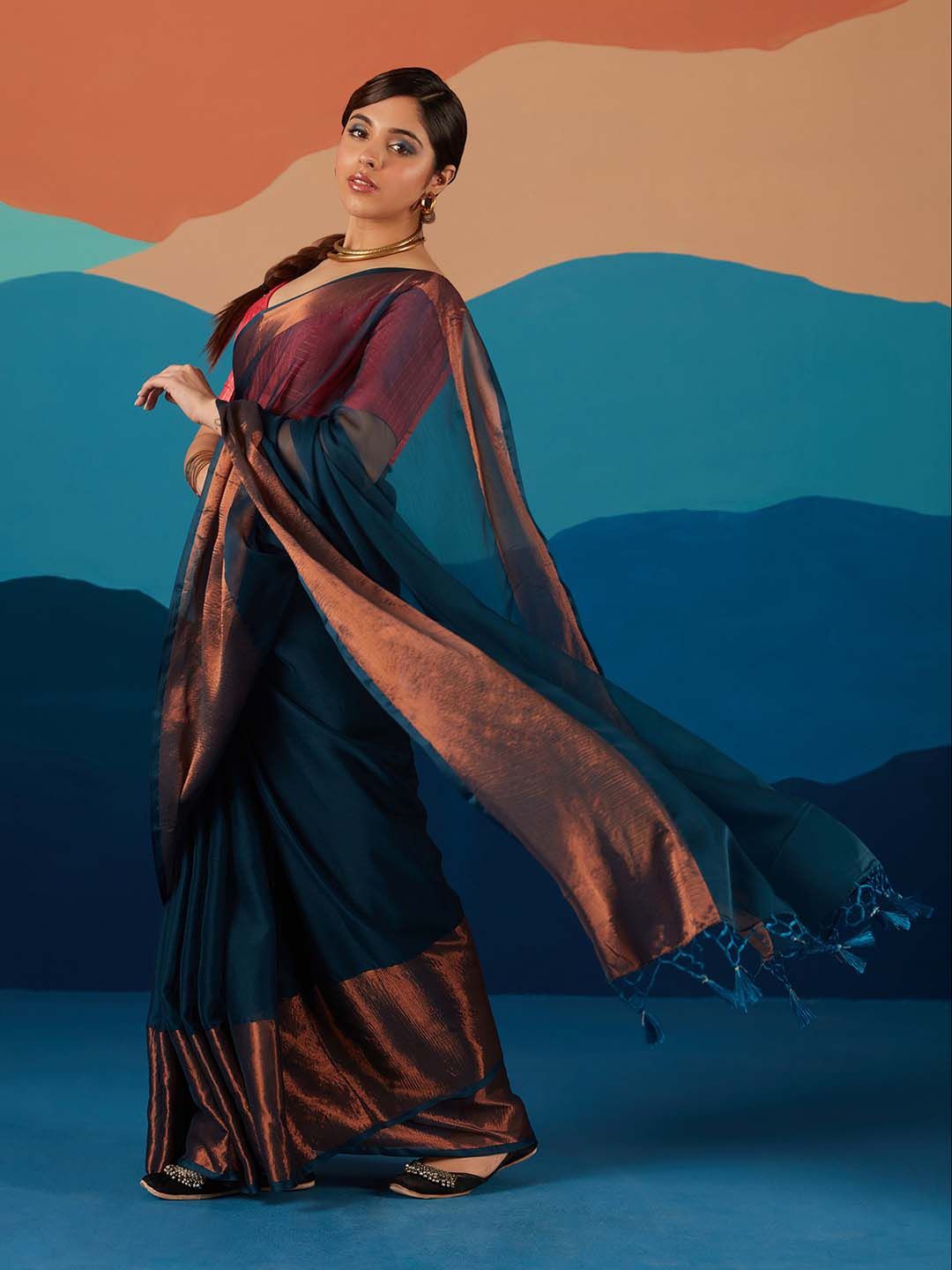 

Likha Zari Poly Georgette Saree, Teal