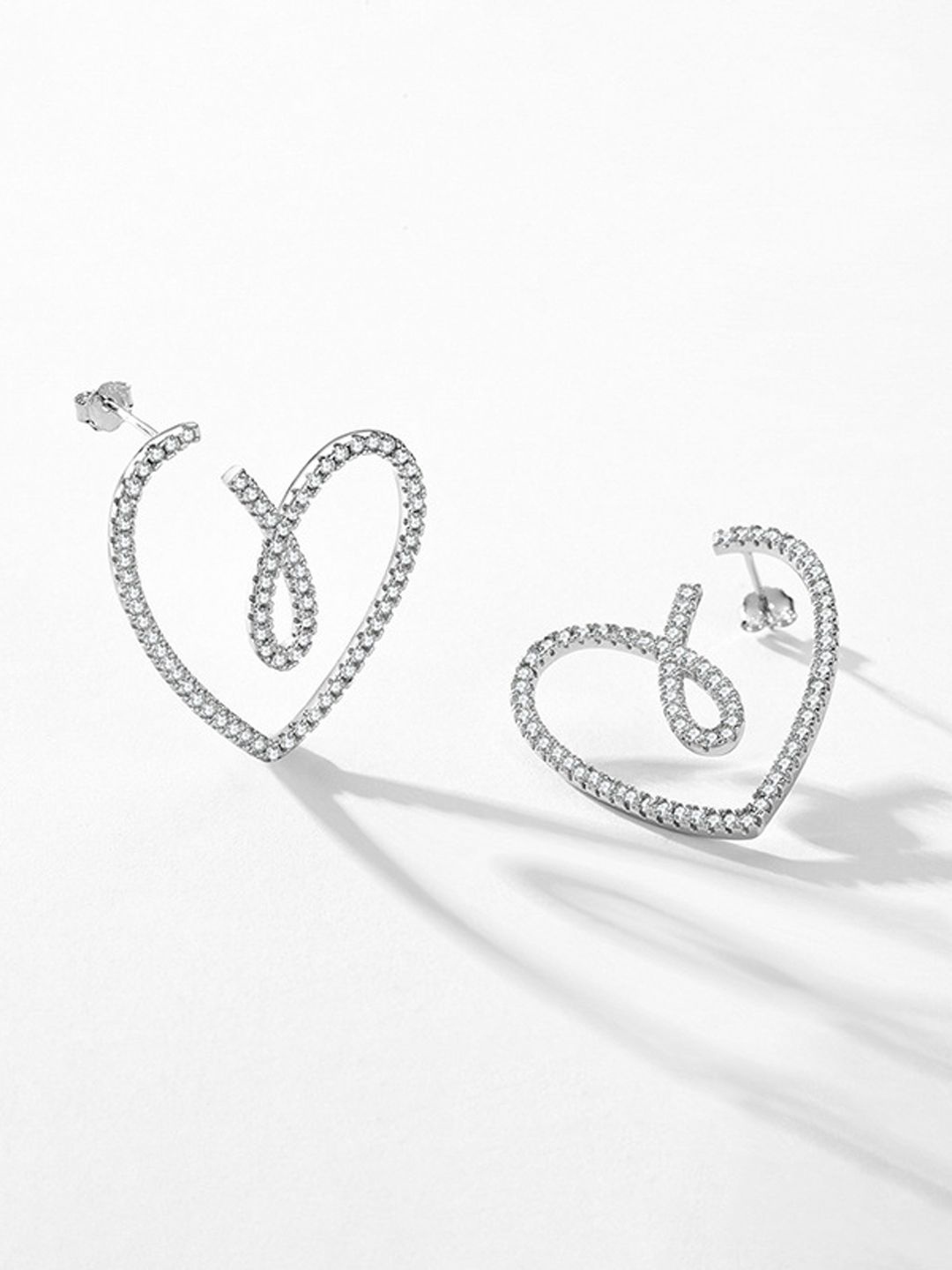 

FIMBUL Heart Shaped Studs Earrings, Silver