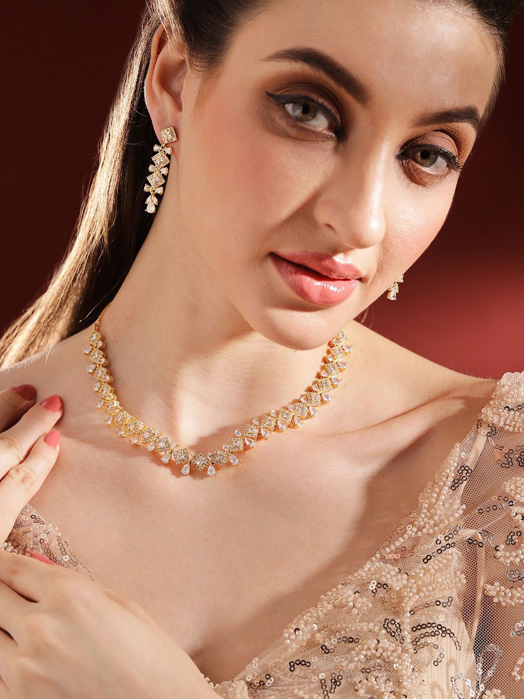 

Priyaasi Gold-Plated American Diamond Studded Jewellery Set