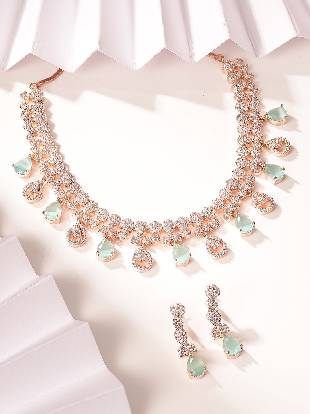 

Priyaasi Rose Gold-Plated American Diamond Studded Jewellery Set