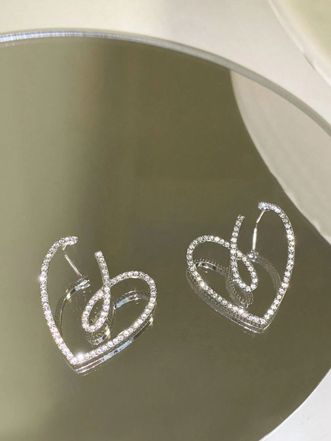 

VAGHBHATT Heart Shaped Studs Earrings, Silver