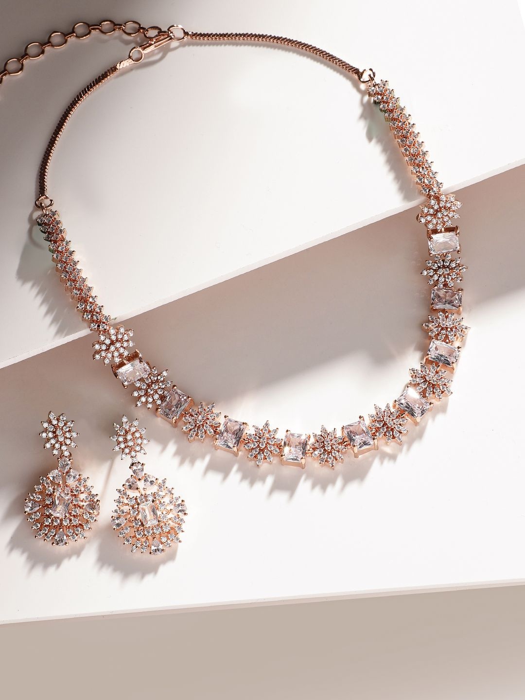 

Priyaasi Rose Gold Plated American Diamond Stone Studded Jewellery Set