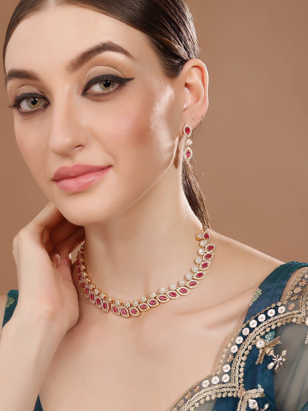 

Priyaasi Gold Plated American Diamond Jewelery Set