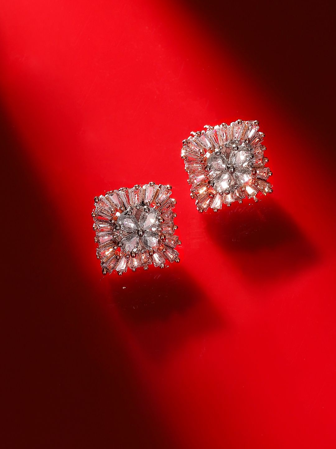 

Priyaasi Rose Gold Plated American Diamond Contemporary Studs