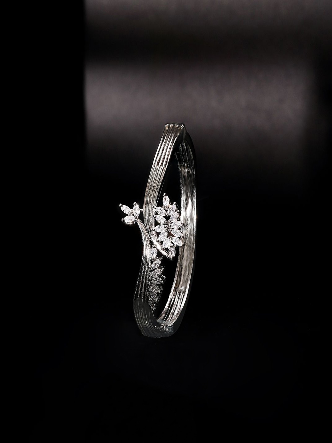 

Priyaasi Silver Plated American Diamond Bangle Style Bracelet