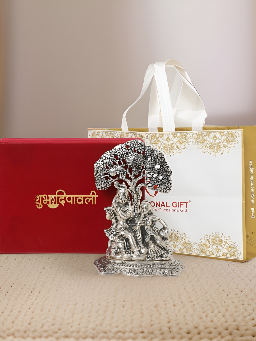 

INTERNATIONAL GIFT Silver-Toned Radha Krishna Metal Religious Idol Showpiece With Box