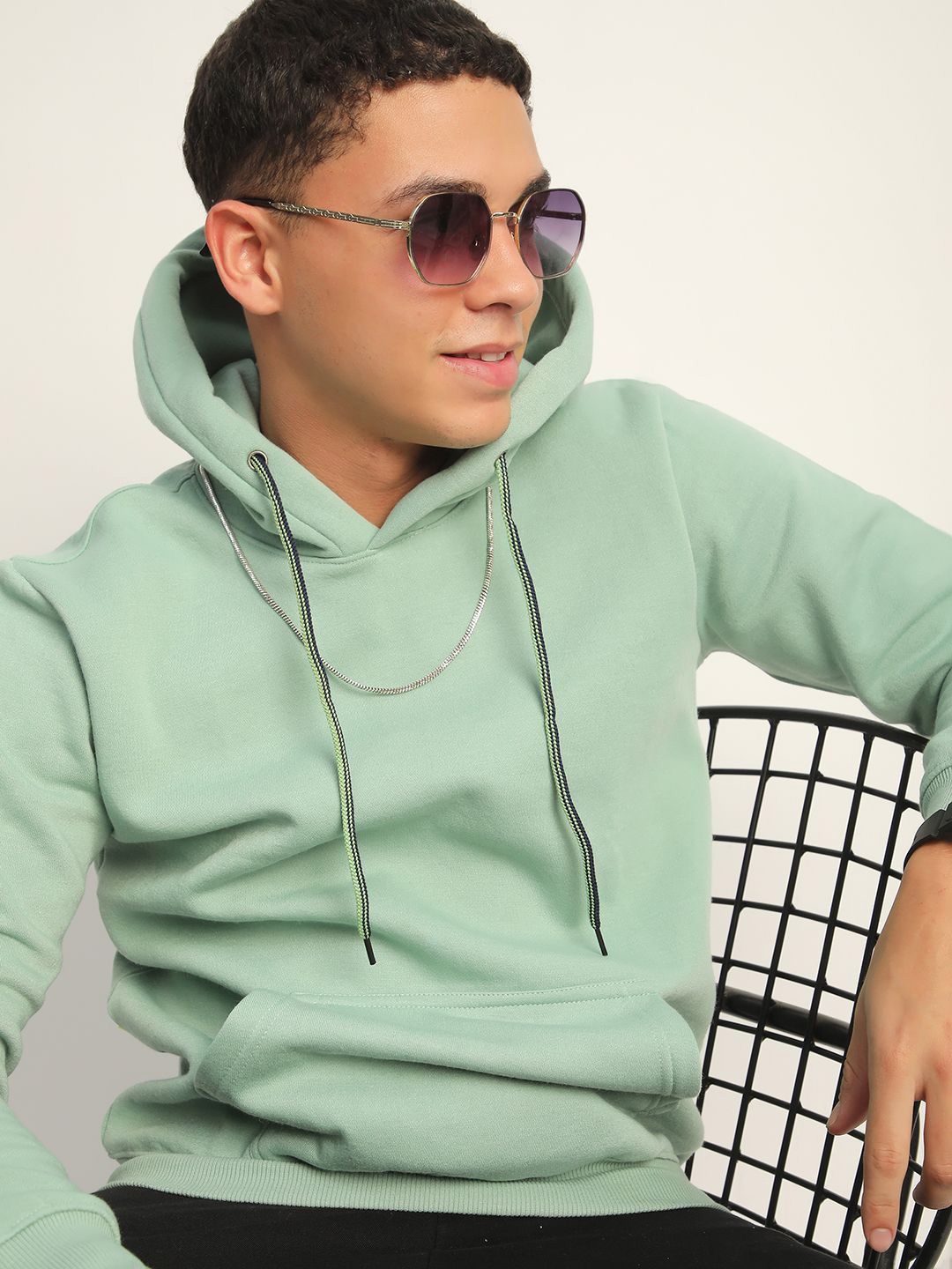 

THALASI Men Solid Hooded Sweatshirt, Green