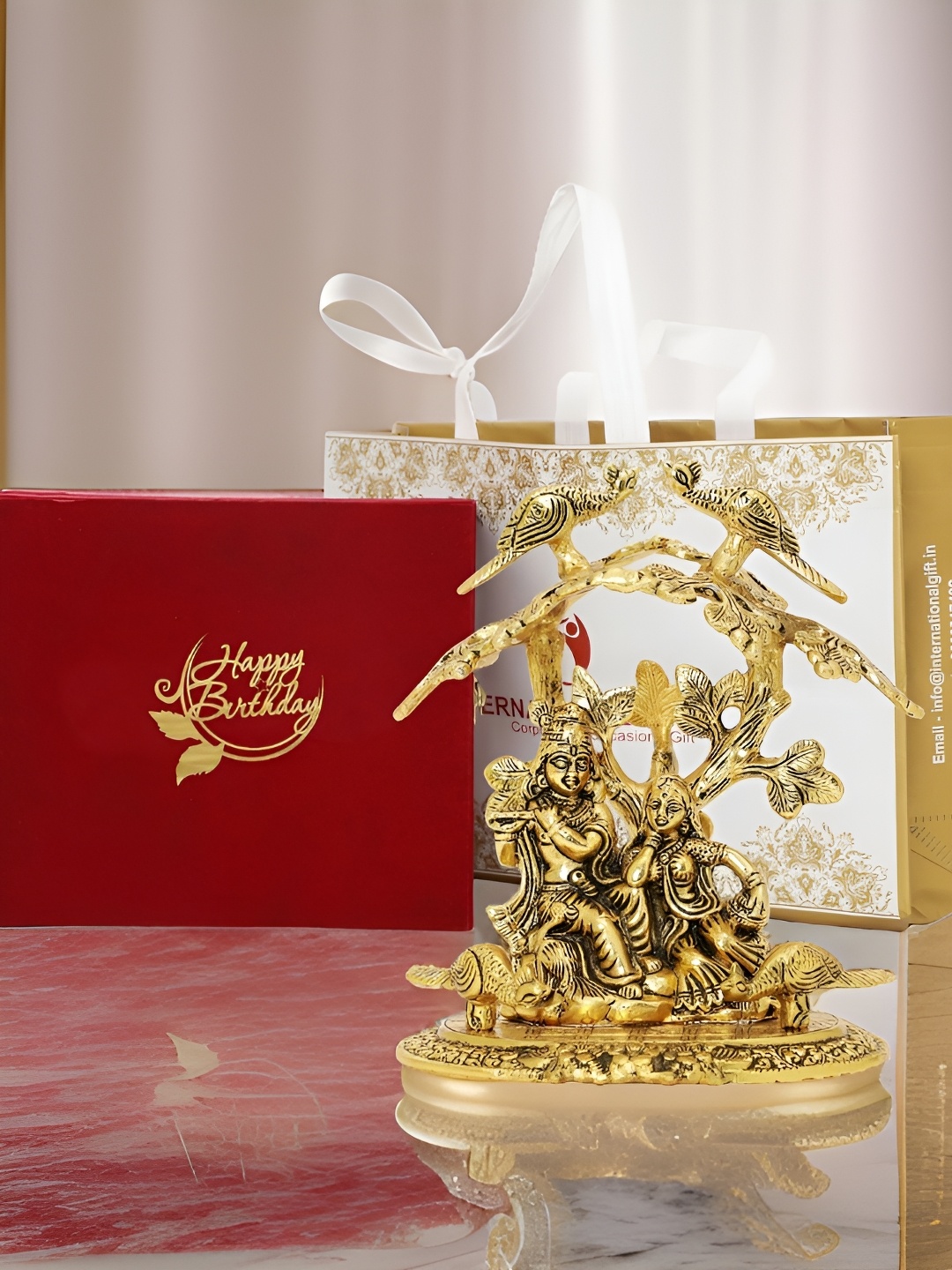

INTERNATIONAL GIFT Gold Toned Radha Krishna Idol With Happy Birthday Tag & Velvet Box