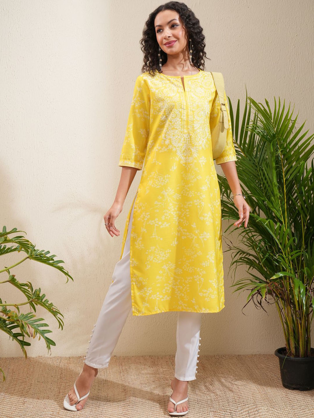 

Vishudh Yellow Paisley Printed Notch Neck Straight Kurta