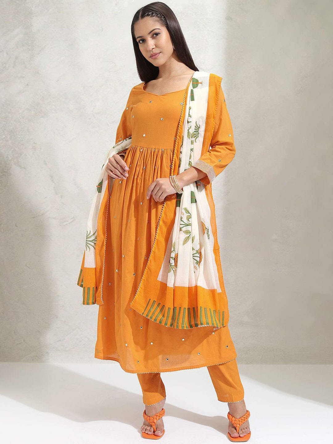 

Vishudh Geometric Embroidered Mirror Work Pure Cotton A Line Kurta & Trousers With Dupatta, Orange