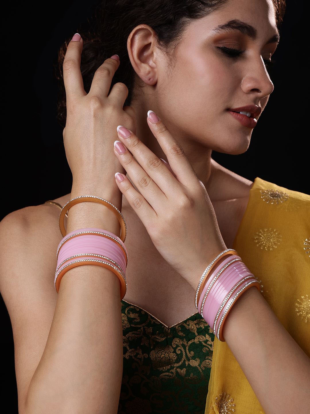 

PANASH Set Of 24 Gold Plated Stones Studded Chuda Bangles