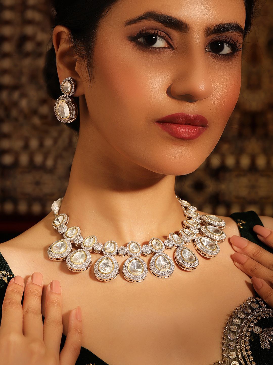 

Priyaasi Silver-Plated Kundan-Studded Brass Necklace and Earrings