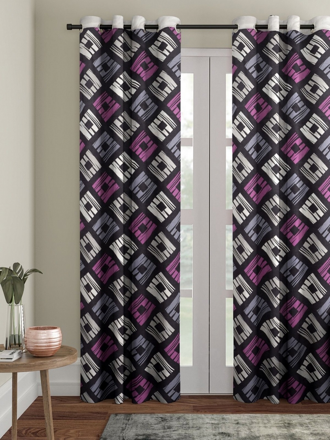 

Myntra Elegant Homes Blue & Pink Geometric Room Darkening Door Curtain