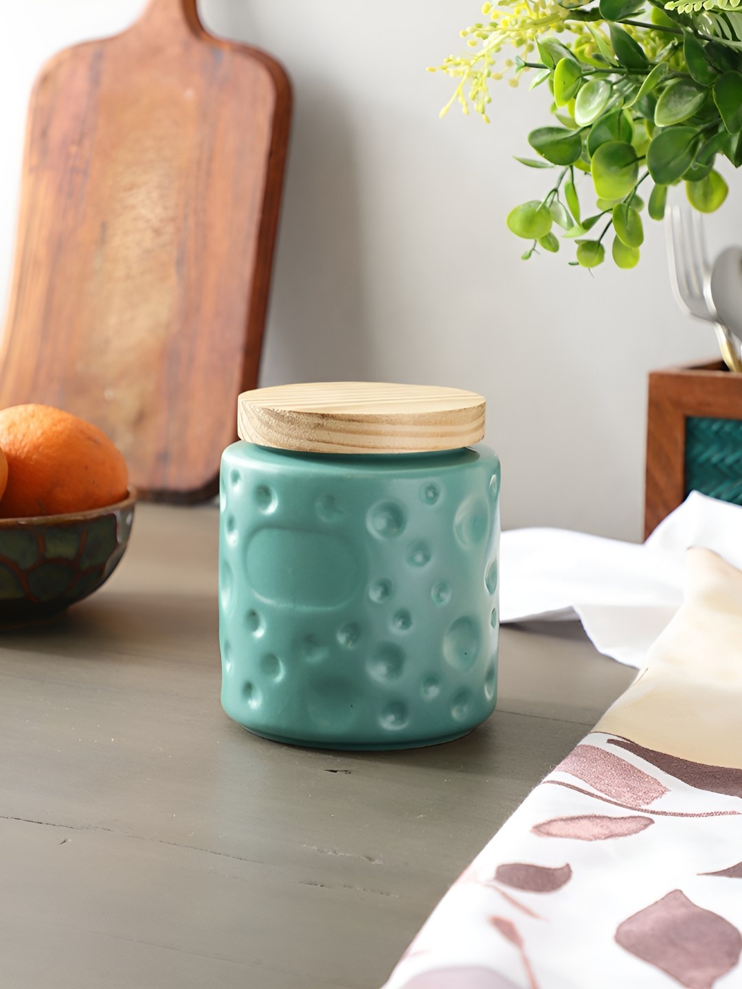 

The Decor Mantra Green Ceramic Dishwasher Safe Jar With Wooden Airtight Lid 800 ml