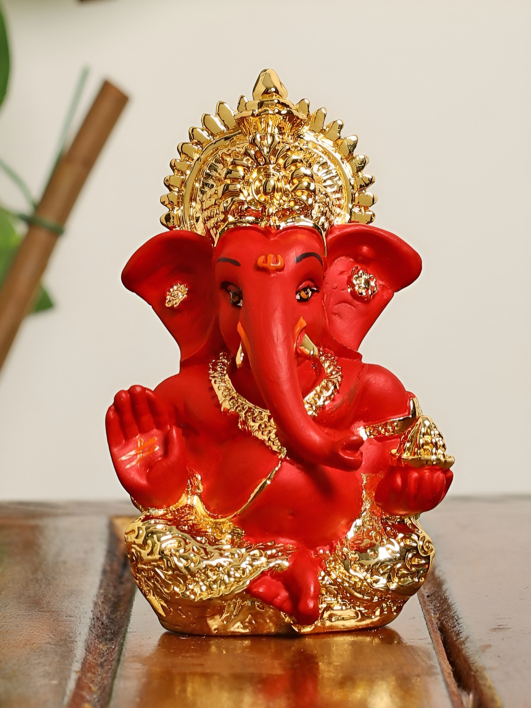 

INTERNATIONAL GIFT Gold Toned & Red Shree Ganesh Murti Showpiece