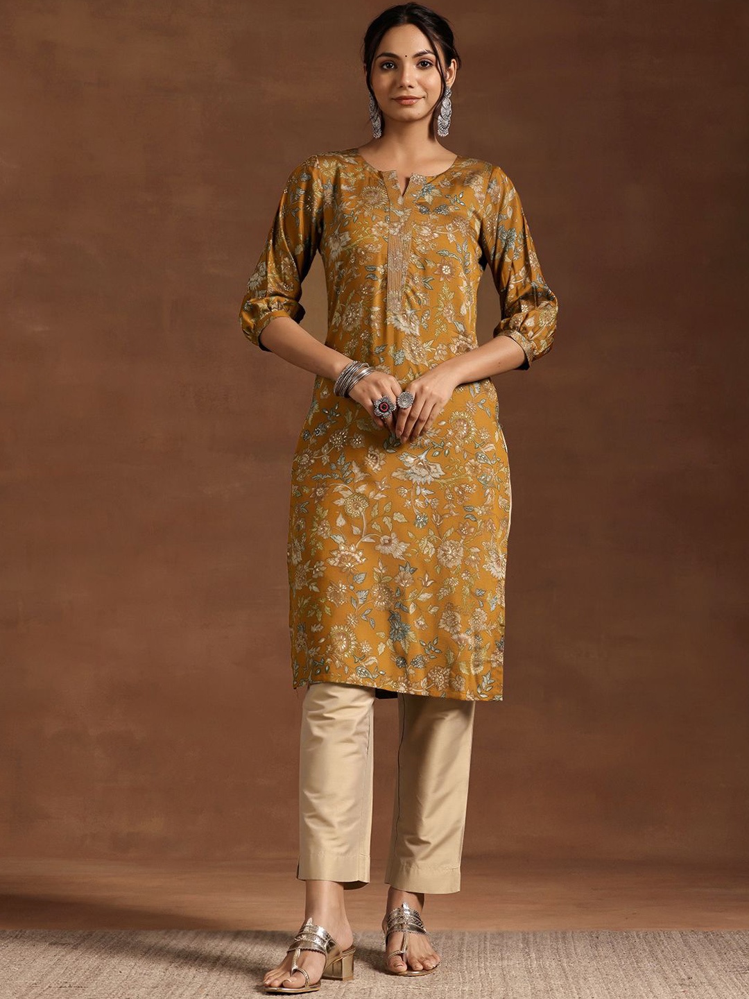 

Libas Floral Printed Notch Neck Puff Sleeves Silk Straight Kurta, Mustard